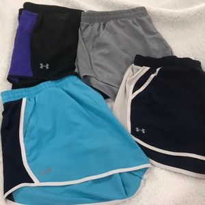 4 pair of Dri-fit Under Armour shorts